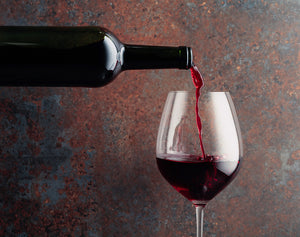wine merchants red-Wine-Is-Poured